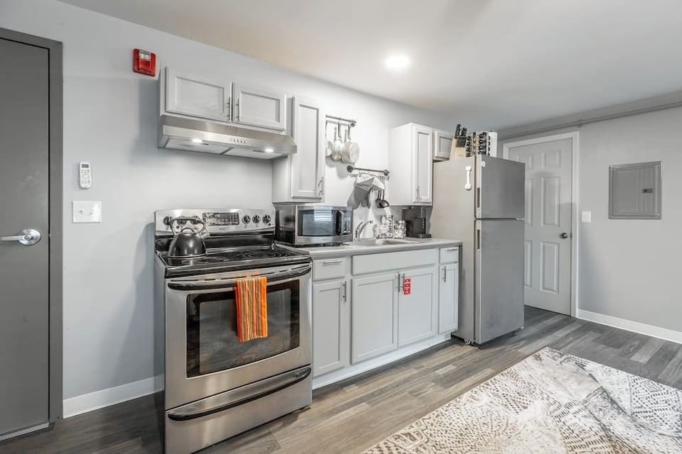A kitchenette is fully stocked and ready to prepare a delicious meal.