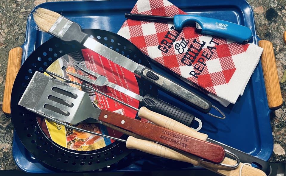 Community grills just past patios - utensils provided, bring your own charcoal