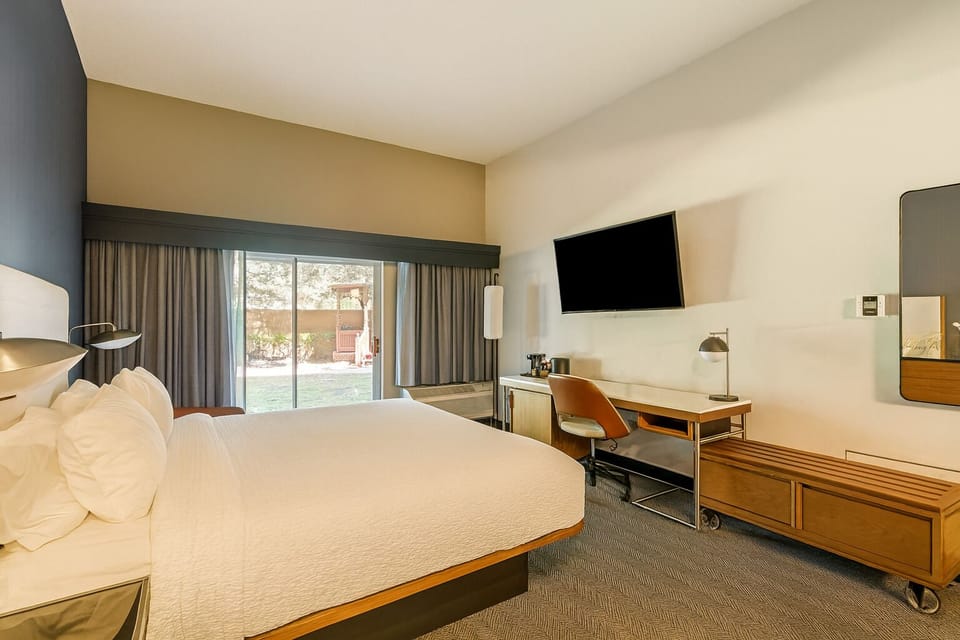 Sink into plush bedding and enjoy easy, airy relaxation.