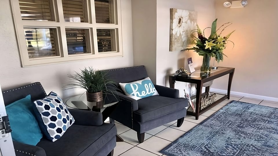 Gather and chat in a stylish lounge with welcoming touches.