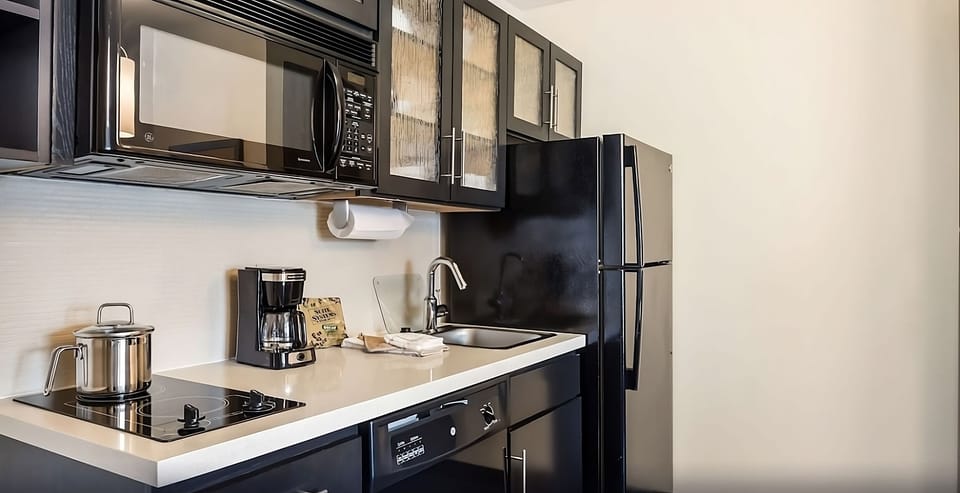 Cook quick meals with sleek appliances and easy counter space.