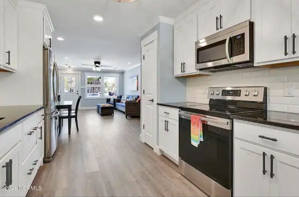 An open layout perfect for entertaining and keeping an eye on the little ones.