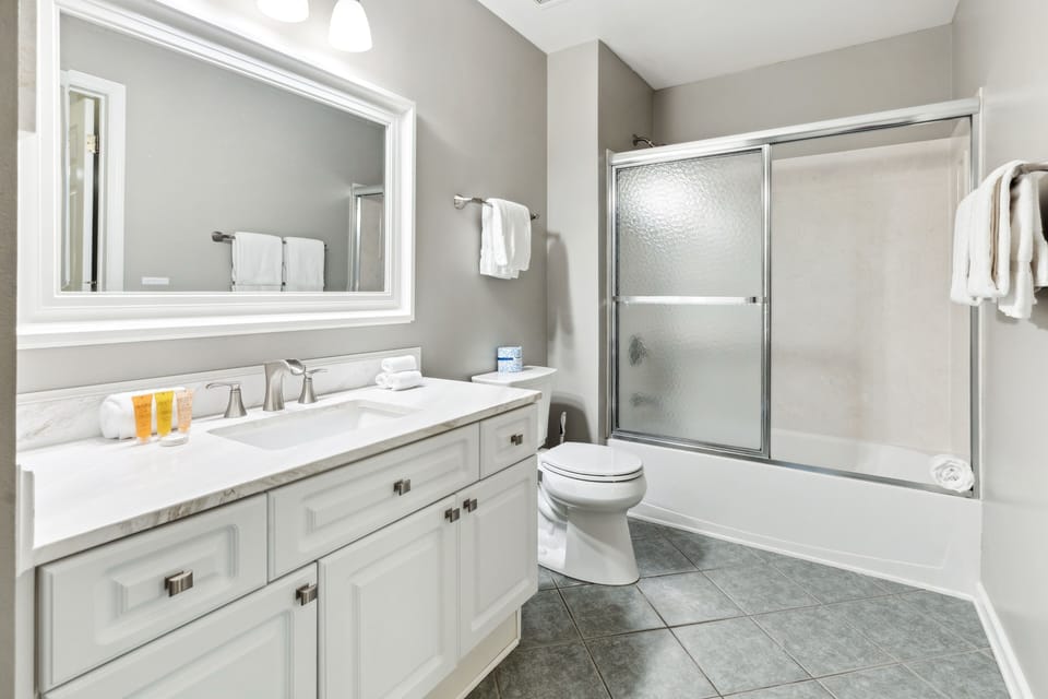 updated guest bath accessible from bedroom or hallway