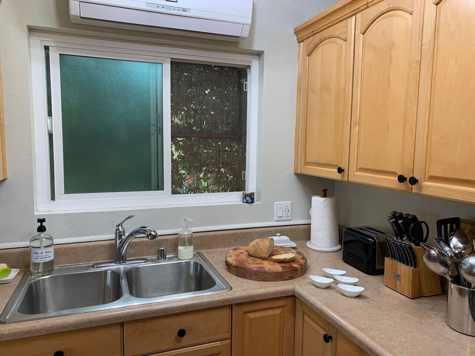 Kitchen sink with a garden window and plenty of prep space