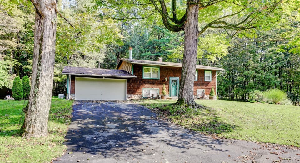 House with Asphalt Driveway, Attached Two Car Garage and Large Sugar Maple
