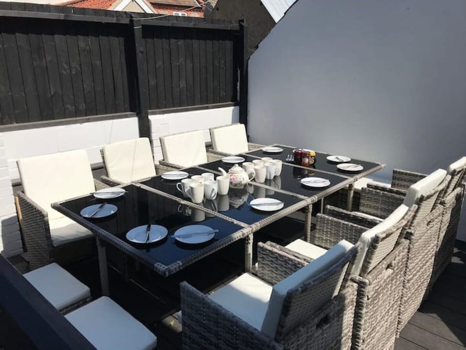Table set for breakfast in the morning sun.  Such a lovely way to start the day.