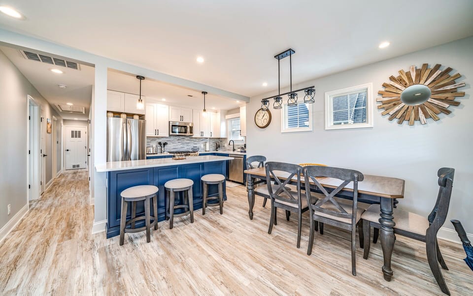 Stylish open kitchen and dining area with seating for ten