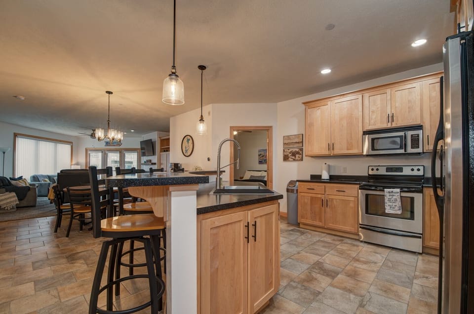 The open design keeps the activities together, from meal prep to hanging out!