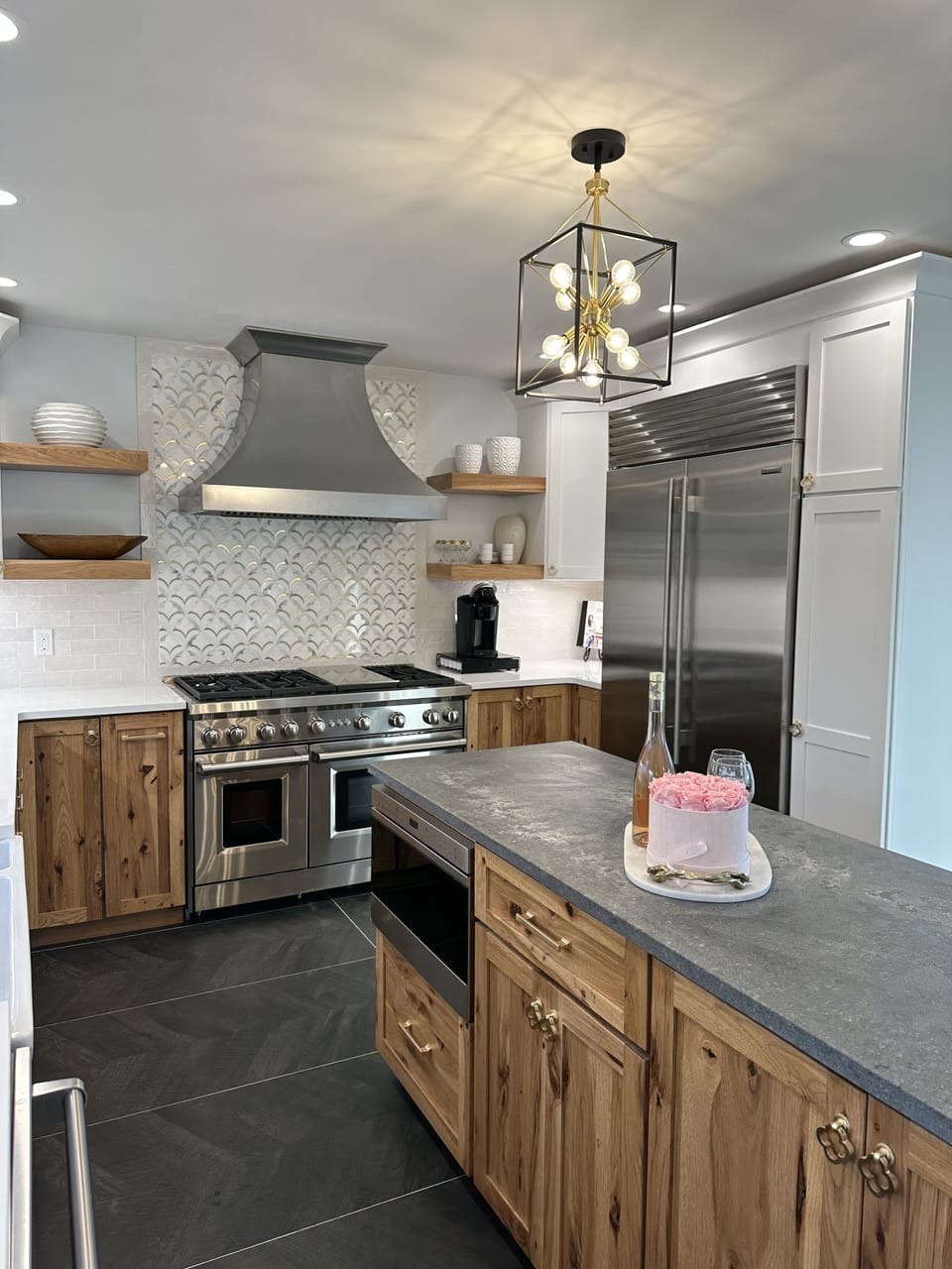 Chefs kitchen with island top of line appliances 