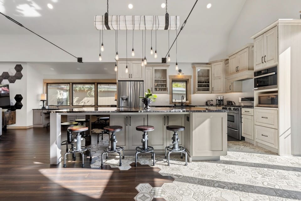 Chefs kitchen: Awesome tile and hardwood flooring throughout main level