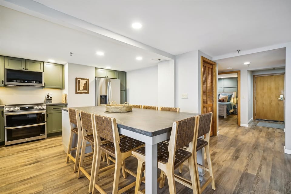 This dining area is so versatile!   Can be used to serve and as a dining table, seats 8