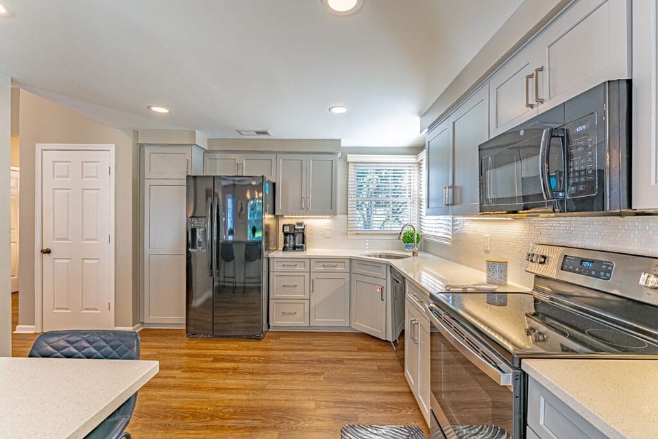 Updated, fully equipped kitchen includes a Coffee Maker and a Keurig.