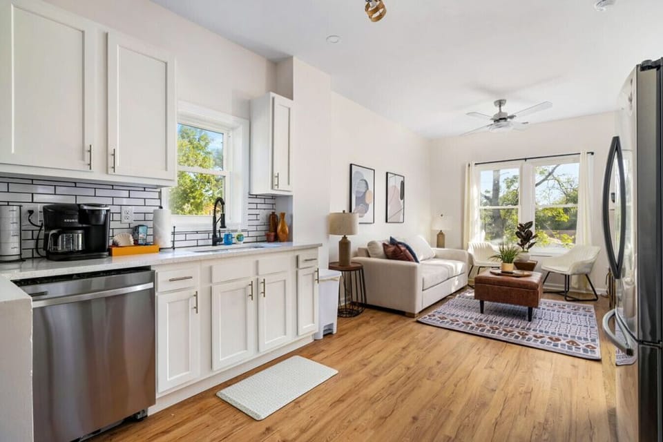 Fully Stocked Kitchen Open to Living Room