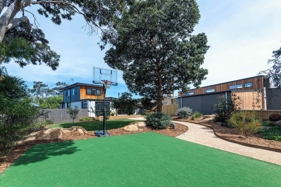 A 6x7m basketball court with hoop and court area available to enjoy!