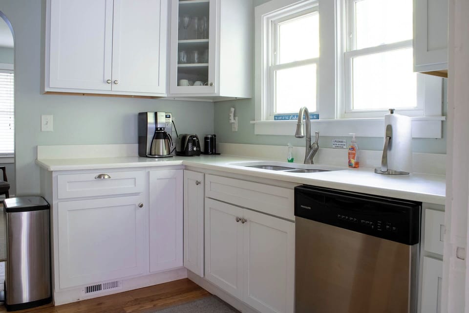 Kitchen with coffee pots, dishwasher
