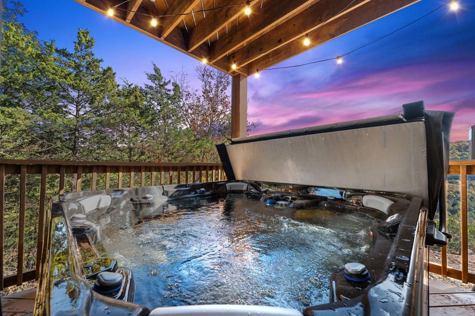 Hot Tub Retreat: Unwind in this bubbling oasis under twinkling lights and vibrant sunsets!