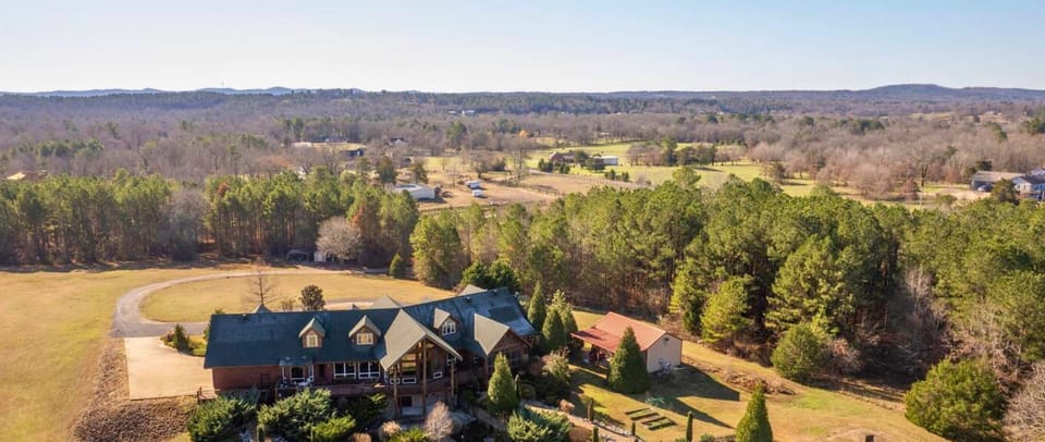 Welcome to The Ranch! A Mega Luxury Cabin Secluded on 30-Acres of Beautiful Land with 6 Bedrooms and All the Amenities you Need for Paradise in Hot Springs, Arkansas.