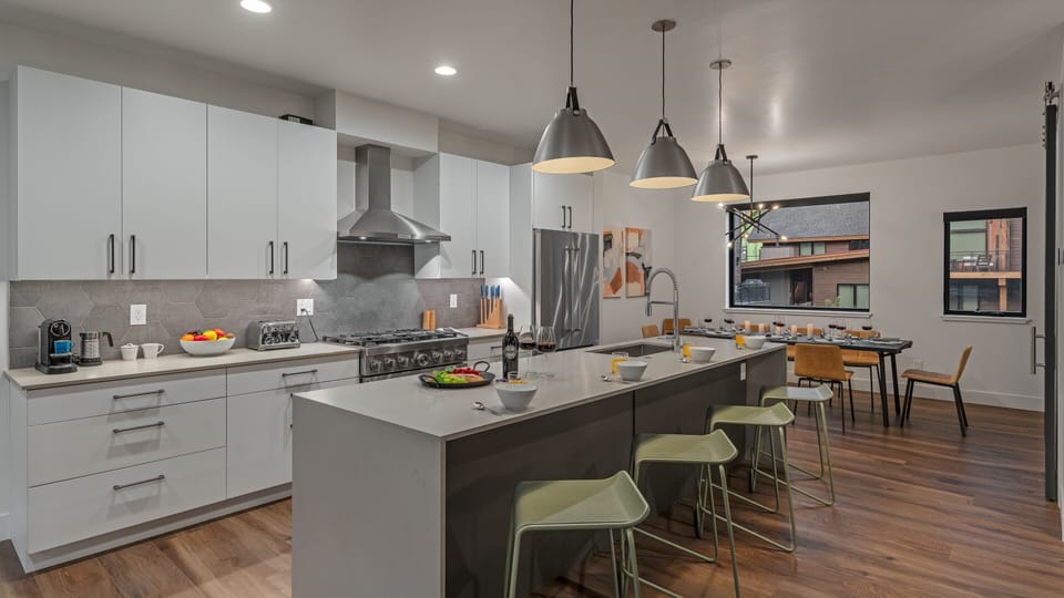 Kitchen, Main Level - With breakfast bar seating