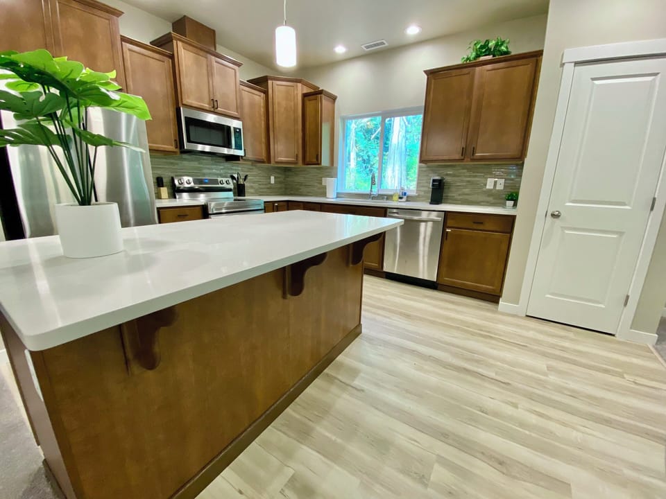 Kitchen. Pots and pans and silverware for 8 are provided as well as cooking oil and spices. 