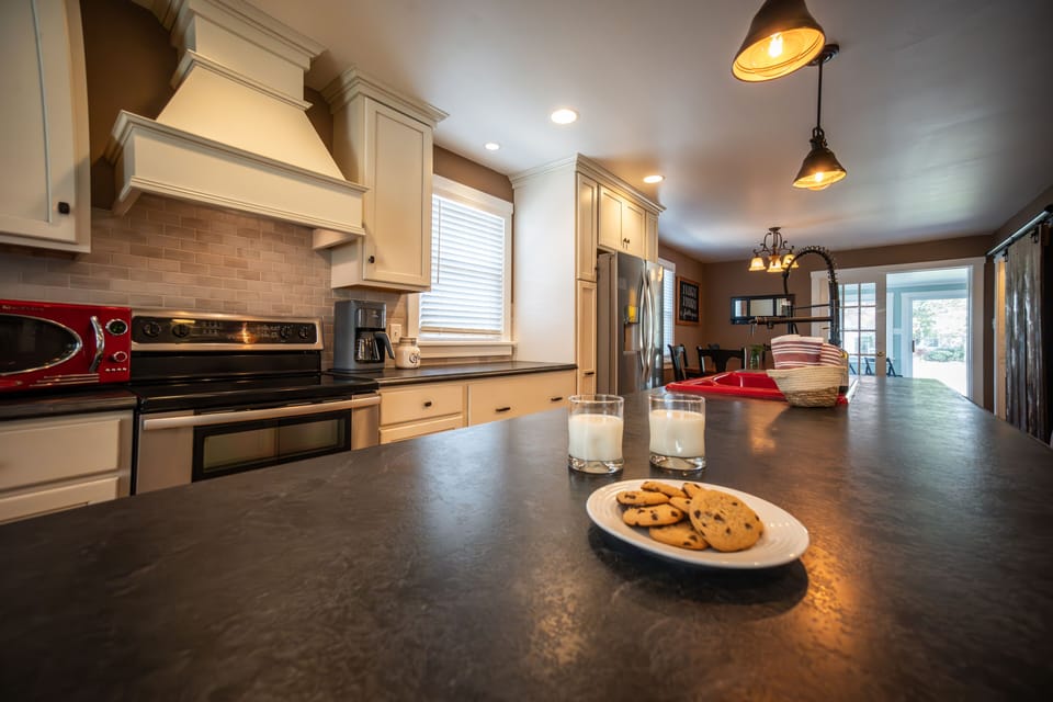 The high top counter stools seats 6 at this 11 foot island.