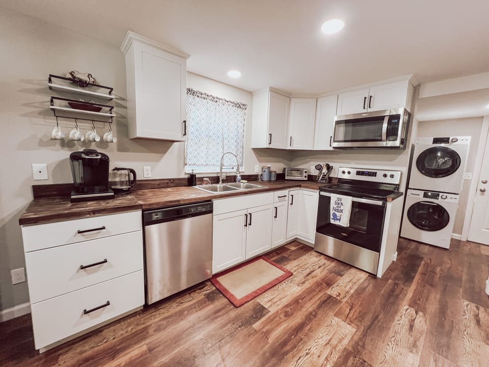 High-end Stainless Steel Electric Stove & Oven, Microwave, Dishwasher & Fridge.