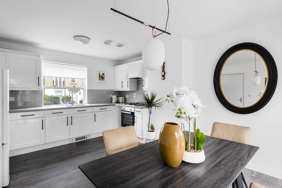 A stylish, modern kitchen designed for both convenience and creativity. Sleek worktops, quality appliances and thoughtful layout make cooking a pleasure, whether you’re preparing a simple breakfast or a gourmet dinner. Bright, open and beautifully finished, this space invites you to gather, cook and enjoy—where everyday meals feel like a special occasion.