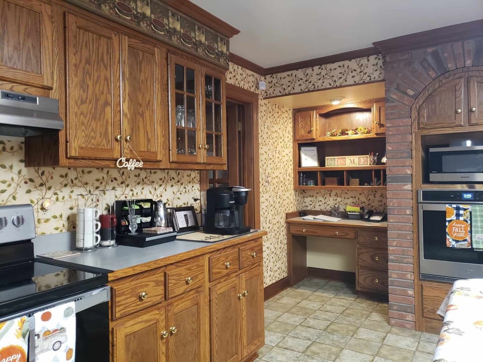 Multiple small appliances, pots/ pans, dishware choices + coffee/tea provided!