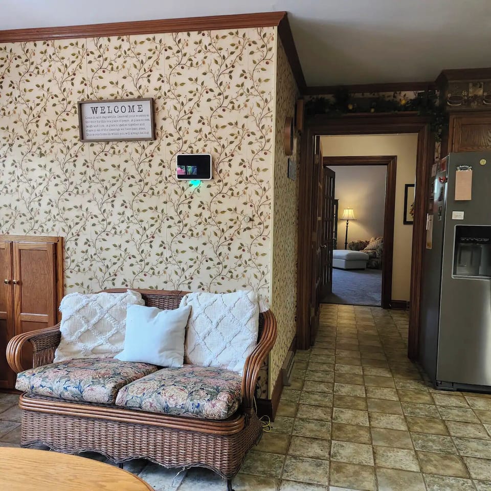 The view from the kitchen to the main entrance and Large Sunlit Queen BR