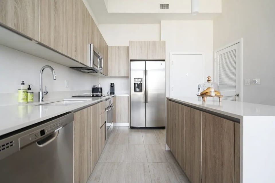 Fully equipped kitchen with modern appliances.