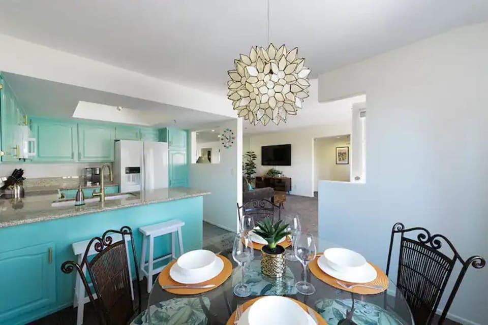 Dining room & kitchen with all-new appliances and mid-century Palm Springs decor