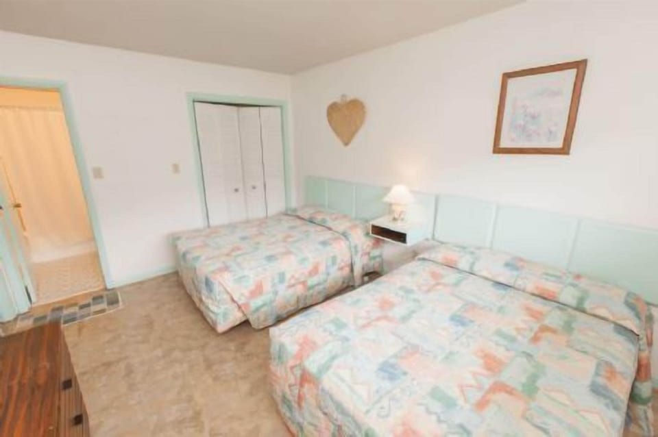 Bedroom 2 with two double beds