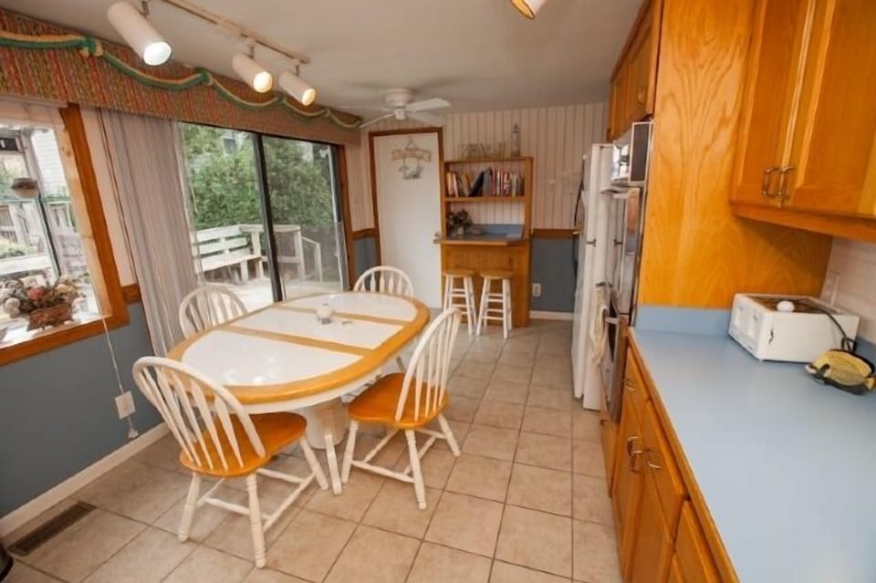 Kitchen with access to deck and pool