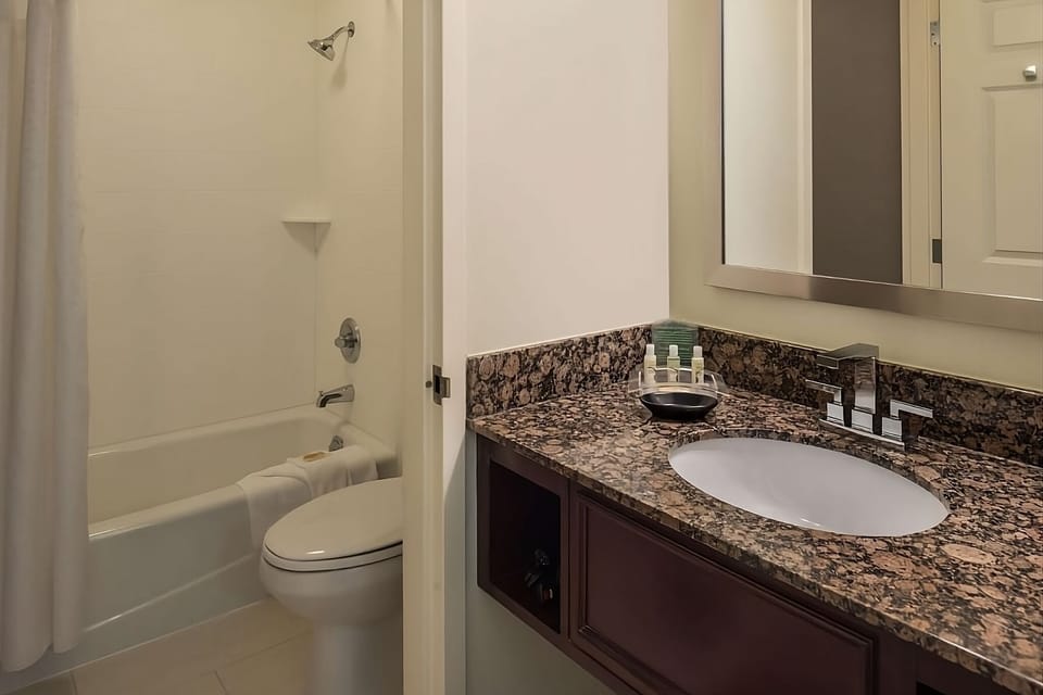 Full bathroom with a shower/tub. Basic toiletries and towels are provided