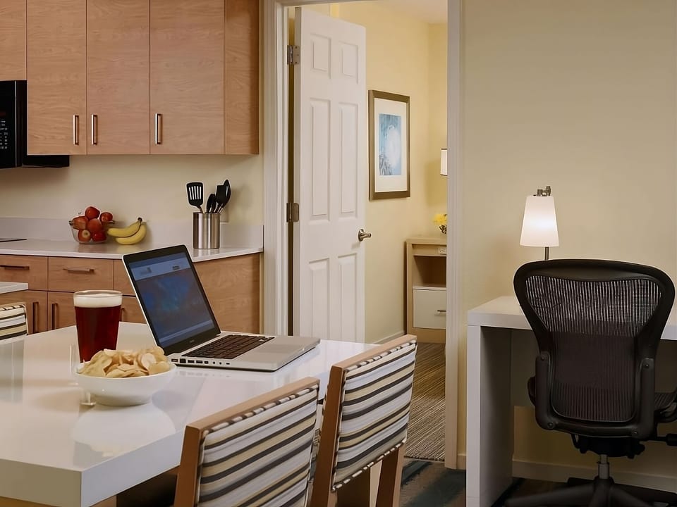 Get productive at the dedicated desk with bright task lighting.
