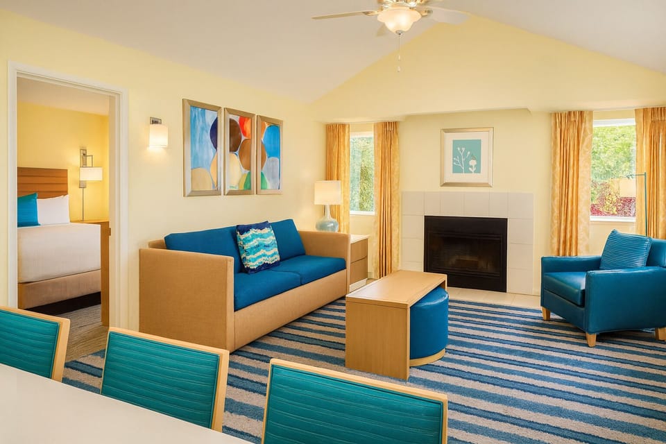 Stretch out in the airy living room with soft seating.