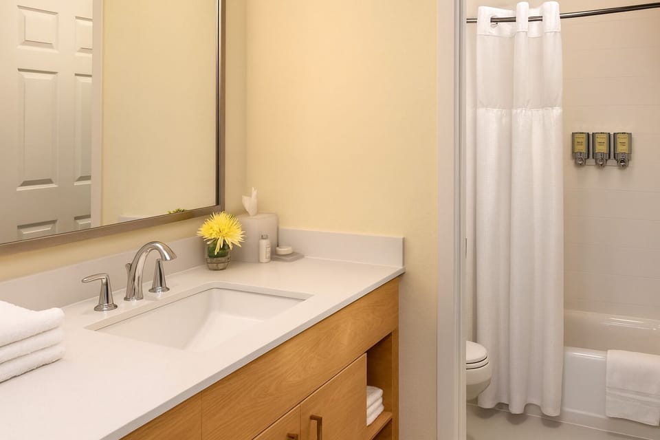 Step into a spotless bath with simple, calming finishes.
