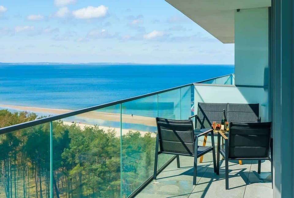 The balcony provides a perfect spot for enjoying the fresh air. 
