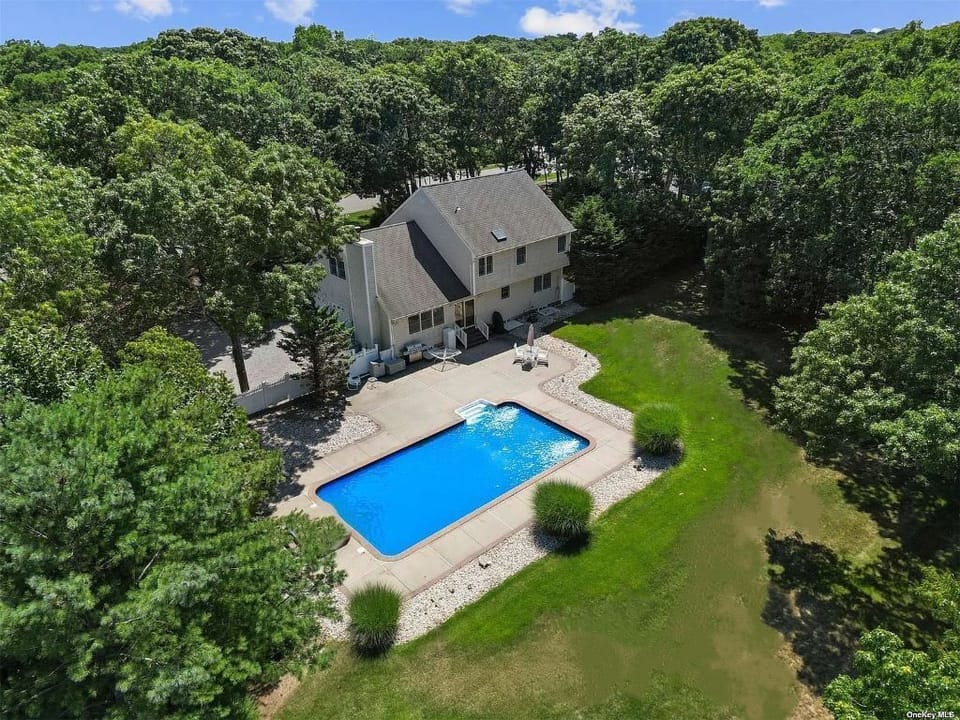 Fully fenced in backyard with a 20x40 Solar Heated Pool