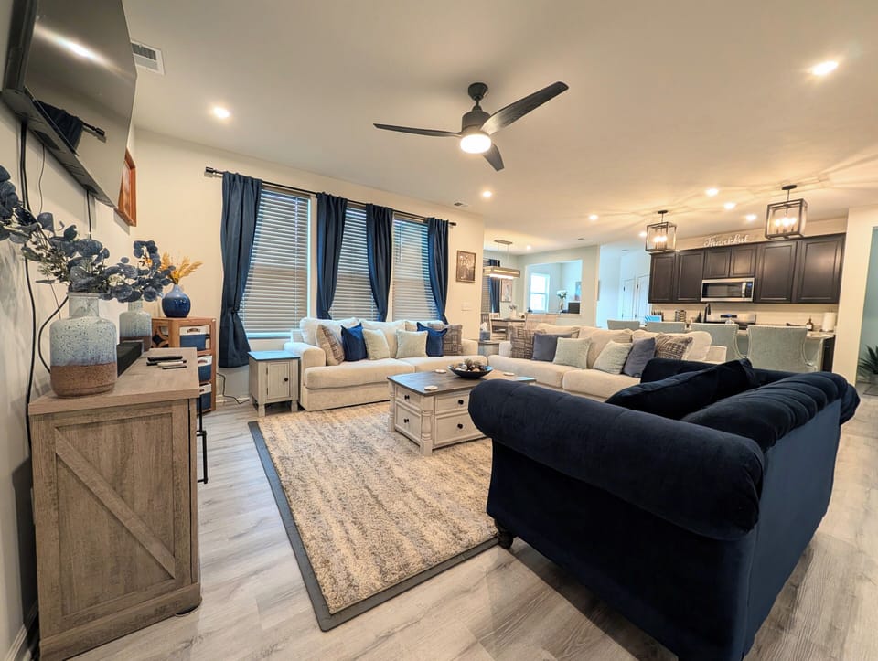 Cozy Great Room with Electric Fireplace, 65" Smart TV, board games  & blankets