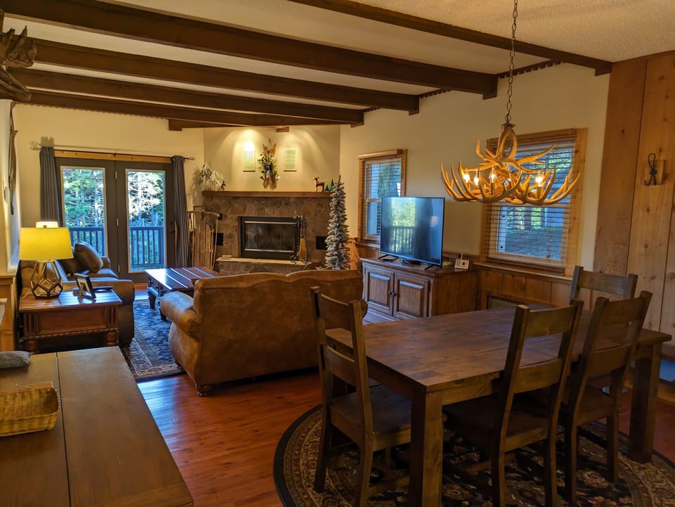From the kitchen through the dining to the living room and wood burning fire