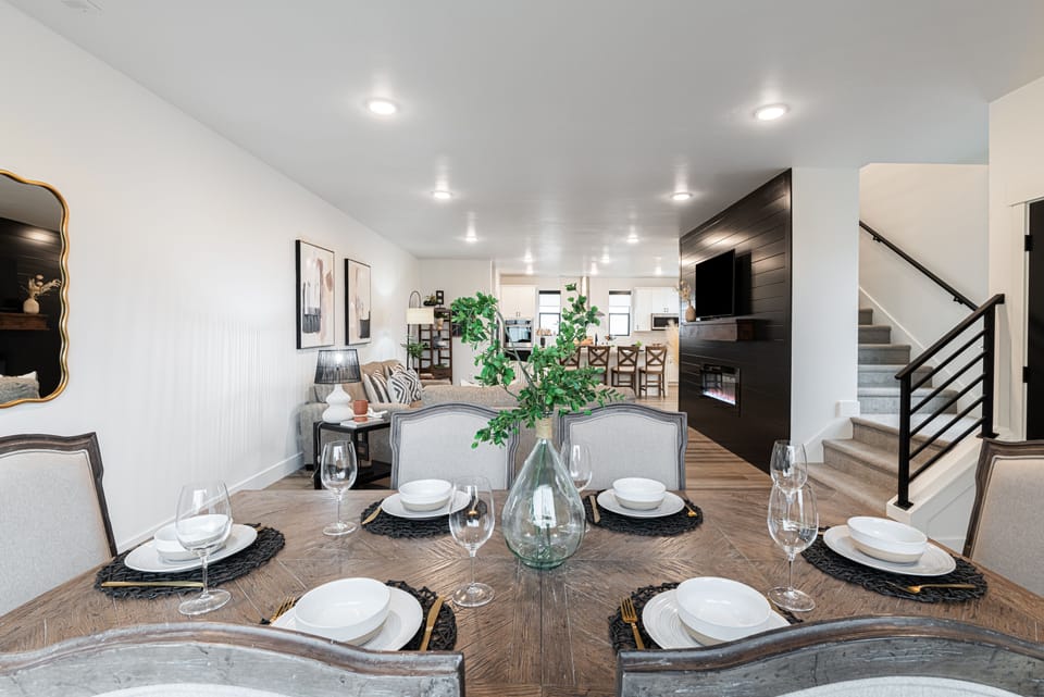 Stairway to upper level from living and dining area