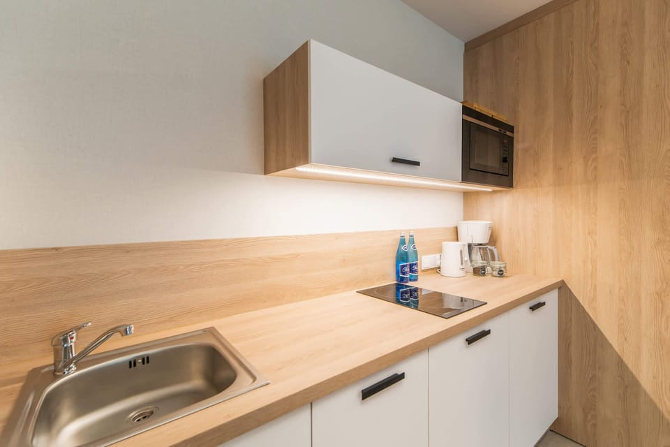 Kitchenette with a microwave.