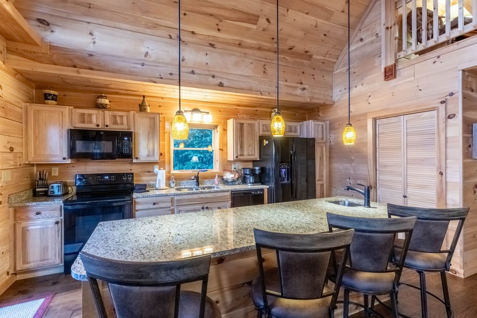 Kitchen - Kitchen with island bar and stools