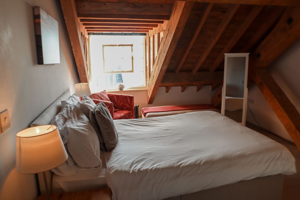 2nd Bedroom with views over the roof-top to Plymouth Sound