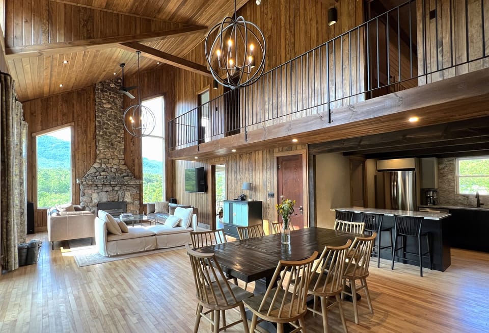 The open living plan provides plenty of space for dining, cooking, and relaxing