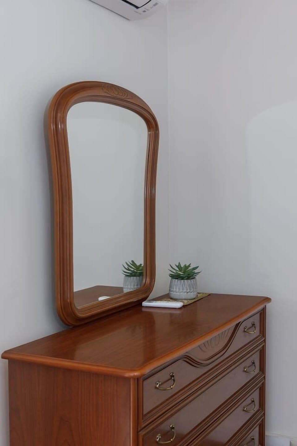 In the third bedroom, you'll find a handy storage drawer for stowing away your belongings.