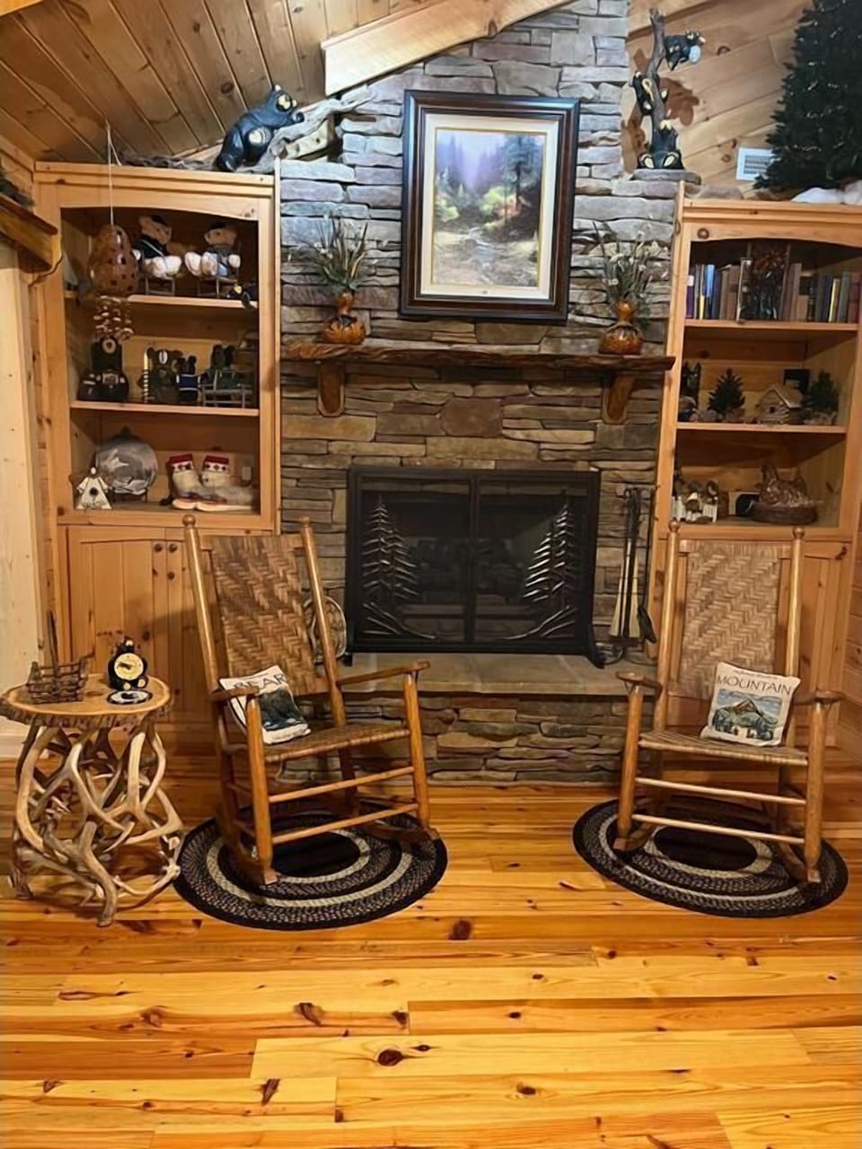Cozy stacked stone fireplace with gas logs