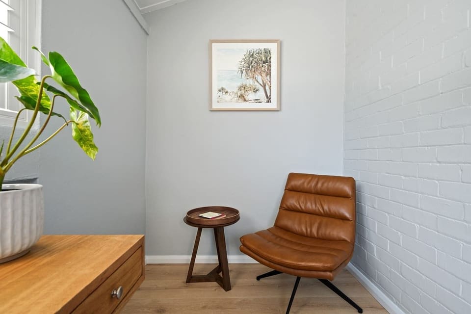 Grab a book and relax in the armless chair for your reading pleasure.