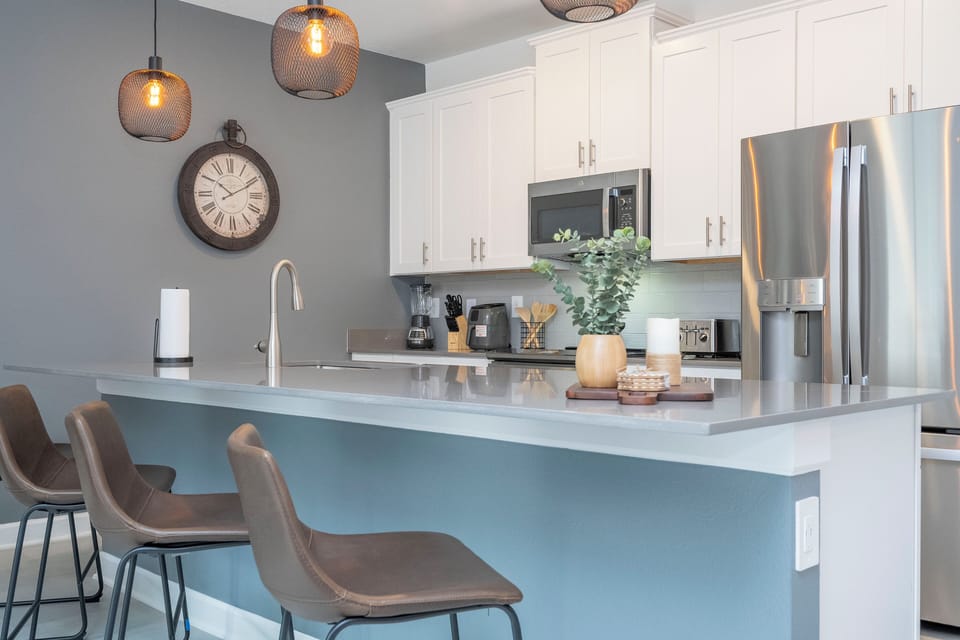 Our kitchen is fully equipped with modern appliances, including a refrigerator, oven, microwave, and dishwasher, making meal preparation a breeze