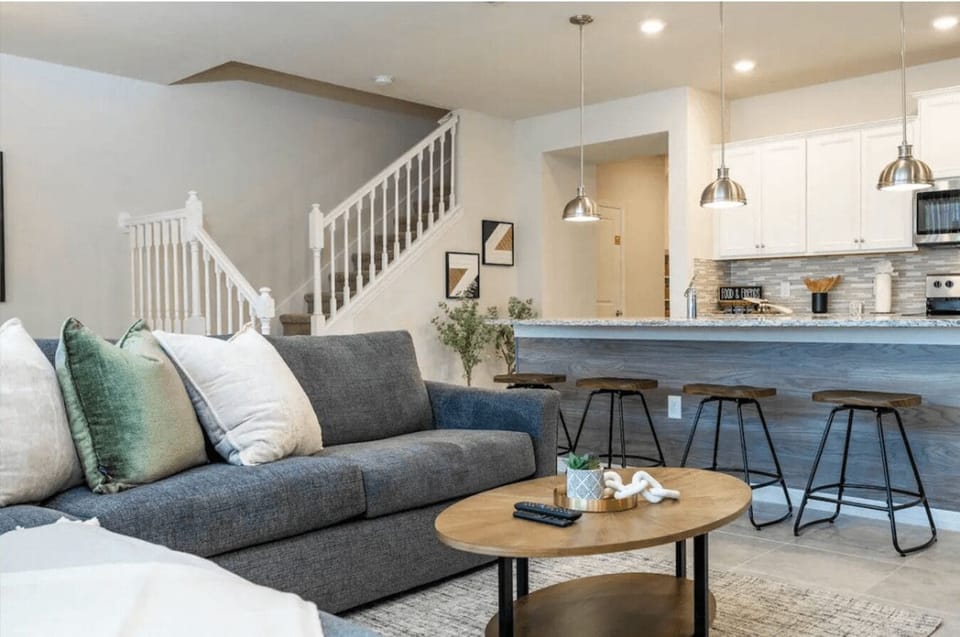 Open living space that seamlessly connects the beautiful kitchen and dining area, offering a perfect blend of comfort and style.